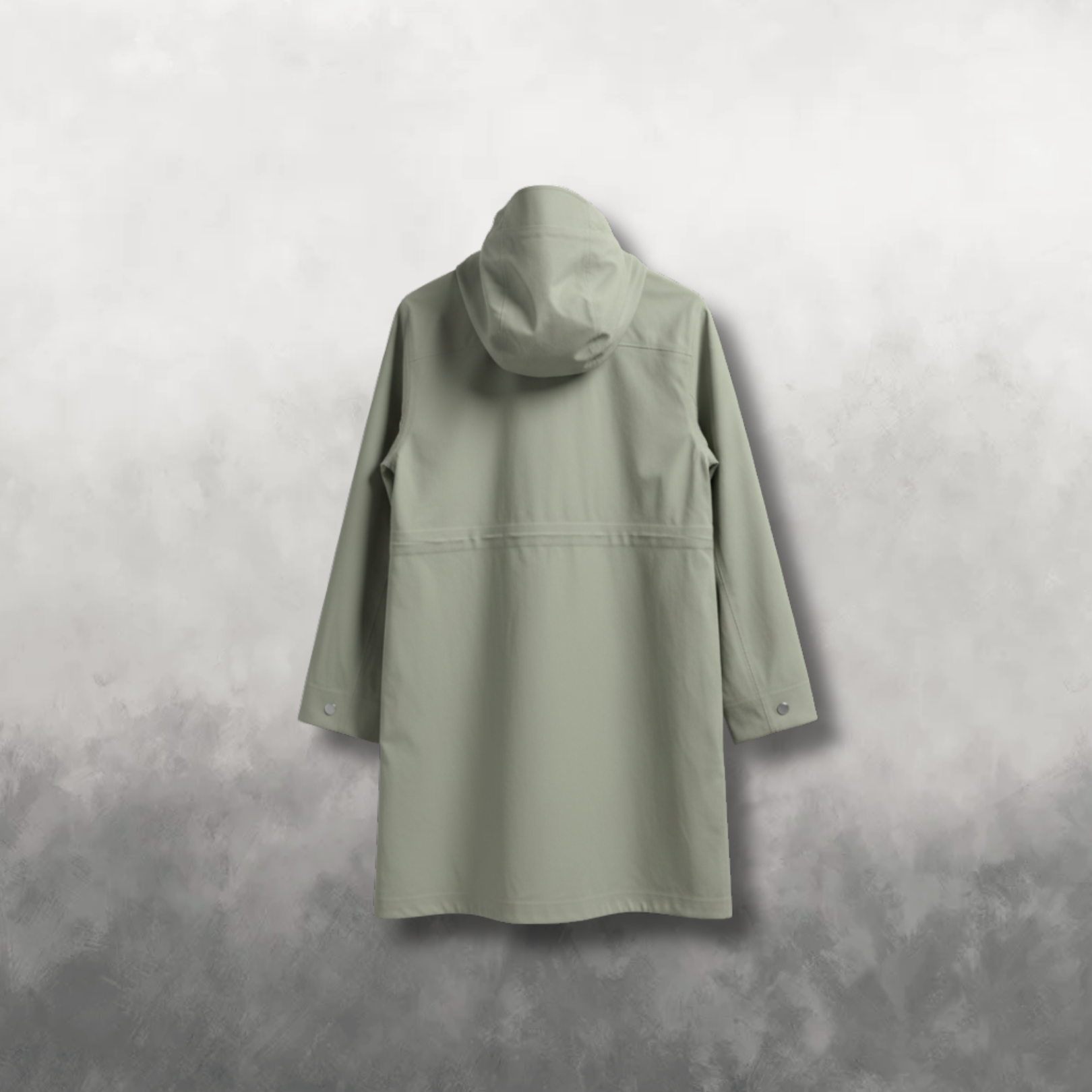 Back view of a green raincoat on a gray background