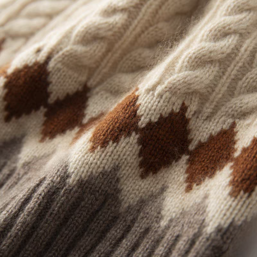 Close-up of a knitted fabric with brown and beige pattern