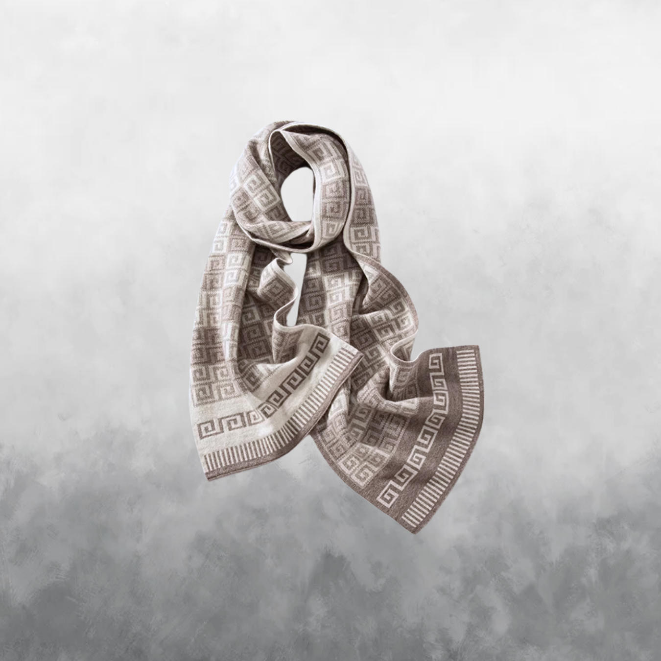 Patterned scarf on a textured gray background