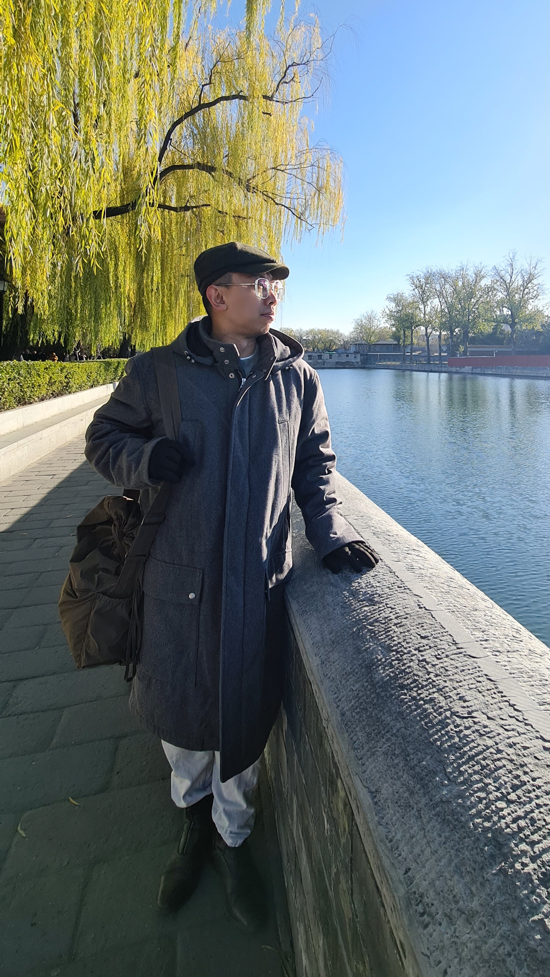 Man outside of Forbidden City wearing Wool Padded Long Parka 
