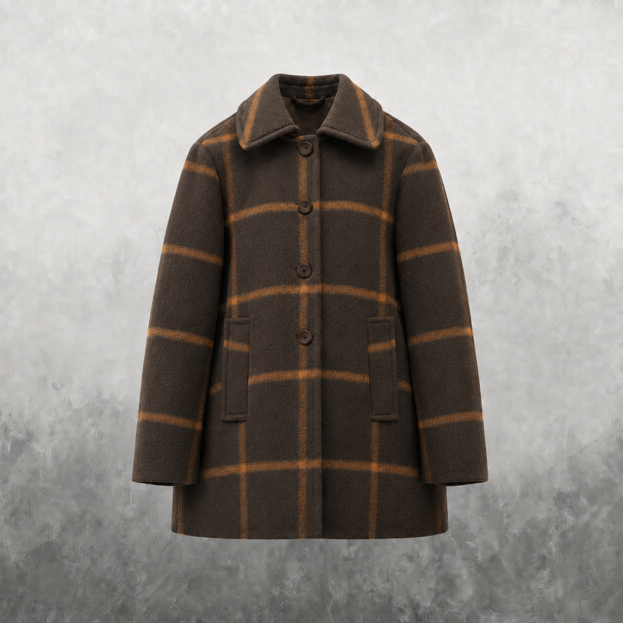 A brown wool-blend coat with a tan windowpane plaid pattern, featuring a notched collar, four front buttons, and two front patch pockets, displayed against a textured gray background.