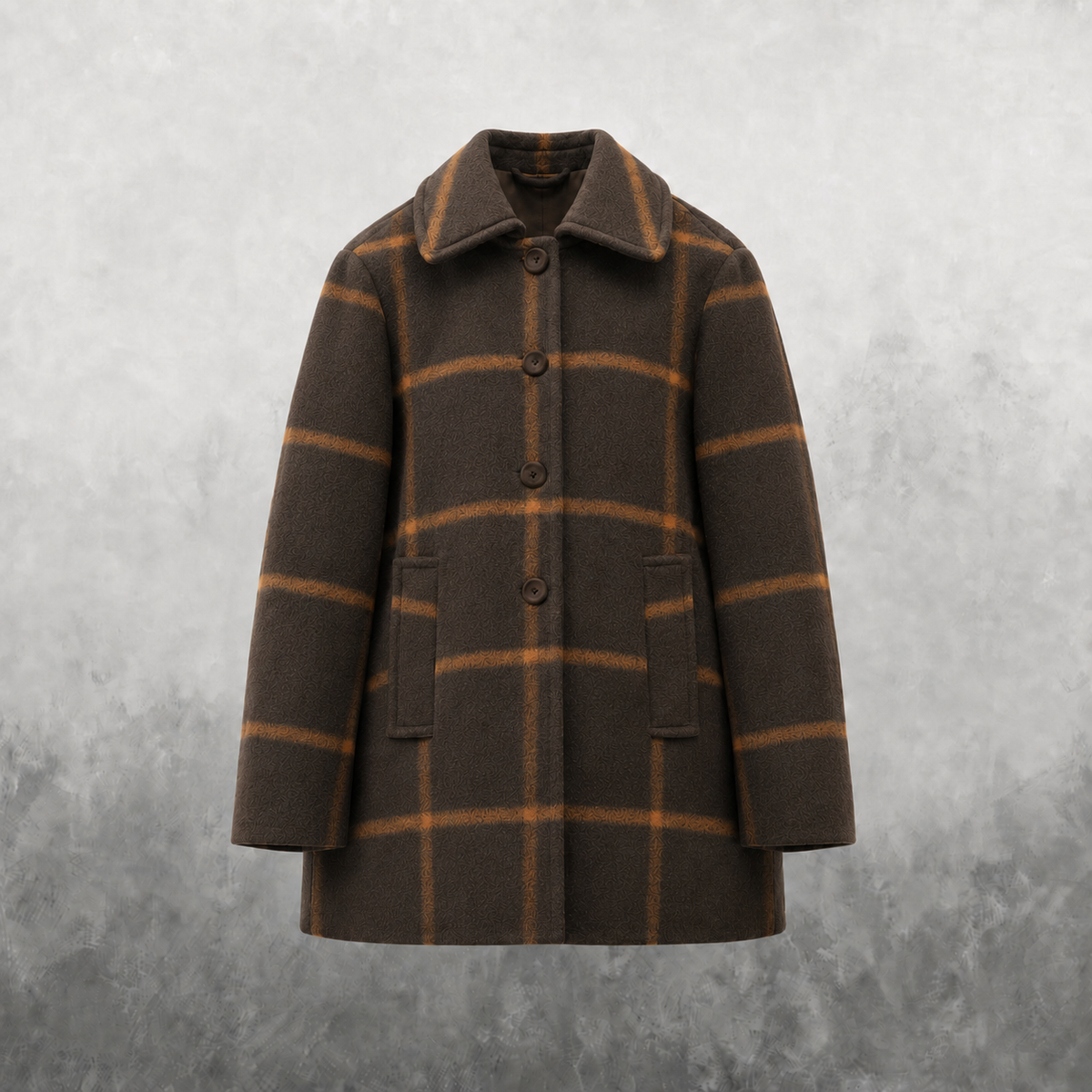 A brown wool-blend coat with a tan windowpane plaid pattern, featuring a notched collar, four front buttons, and two front patch pockets, displayed against a textured gray background.